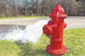 hydrant with water being released.