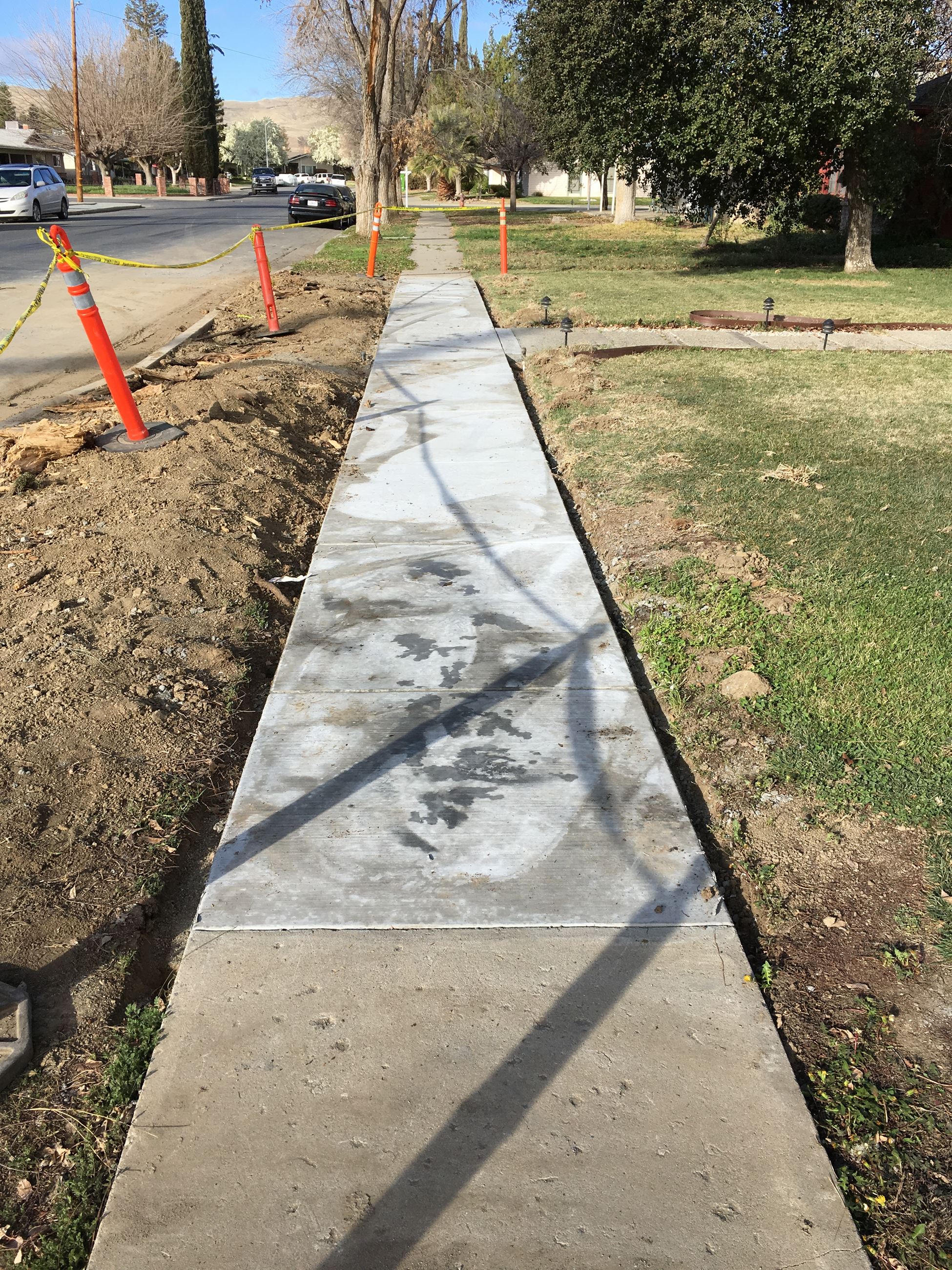 434 Madison new sidewalk and concrete drying